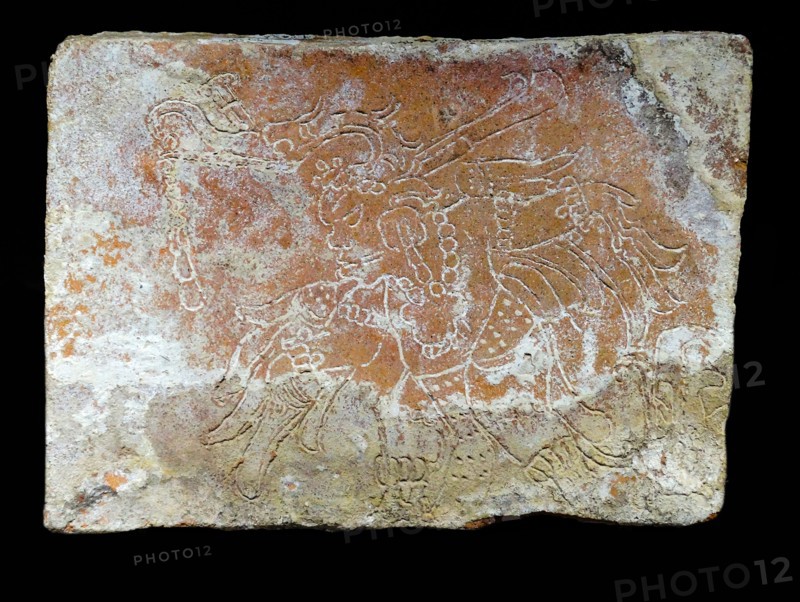 Ceramic brick depicting a dancer from the Mayan ruins at Comalcalco