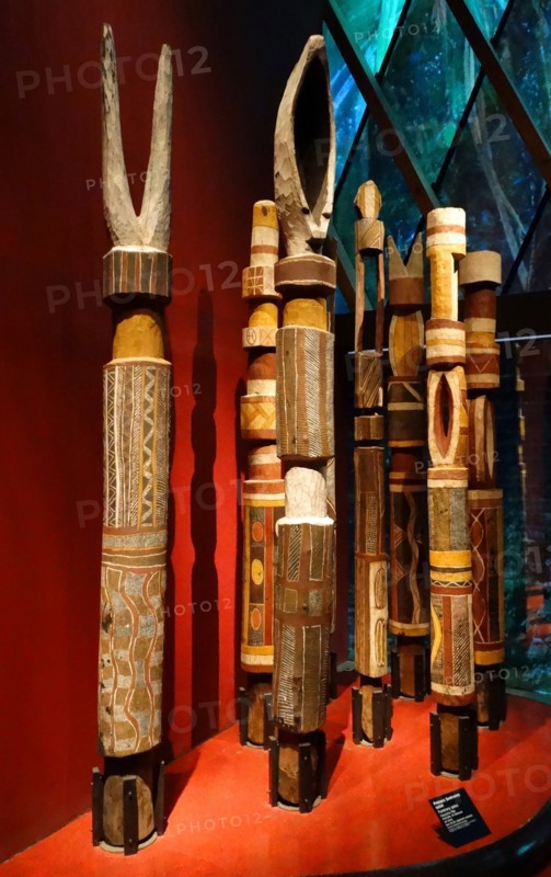 painted wooden, tribal funerary posts, made by the Tiwi people of Bathurst Island, Australia.