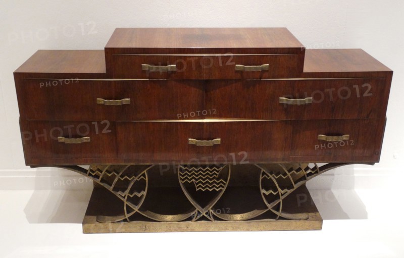 Commode with drawers set on a latticed bronze base, 1933, by Eugène Printz,