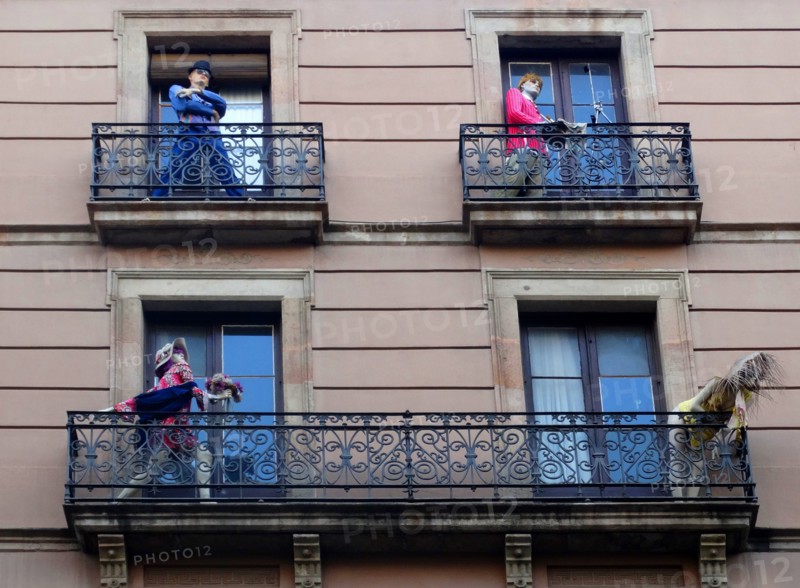 Façade of apartments with mannequins, Barcelona, Spain