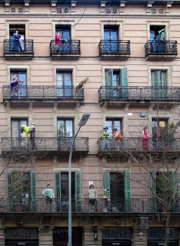 Façade of apartments with mannequins, Barcelona, Spain