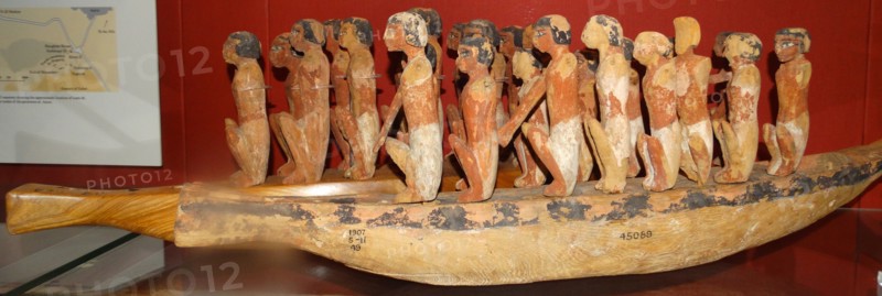 Model boat with crew of paddlers