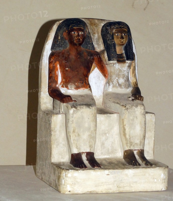 Painted limestone statue of an unnamed man and his wife from a tomb-chapel at Thebes, 18th Dynasty about 1350 BC.