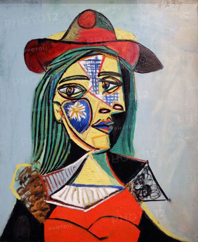 Woman in Hat and Fur collar by Pablo Picasso