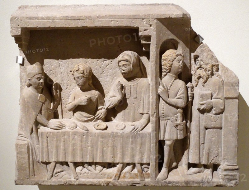 Stone carving depicting Saint Andrew being tempted by the Devil by Bartholomew Robió