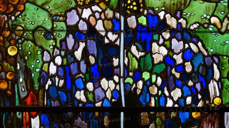 Stained-glass triptych titled 'The Blue Pool' by Joaquin Mir Trinxet