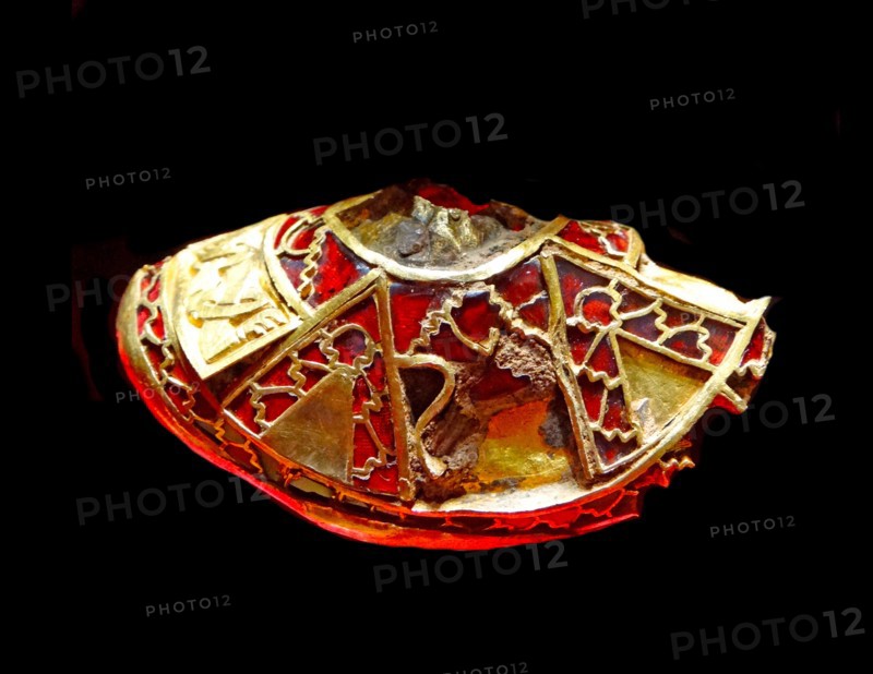 part of the boss from a shield, the lid to a Christian chalice, or the stopper to a drinking horn. Staffordshire Hoard. Anglo-Saxon.7th or 8th centuries