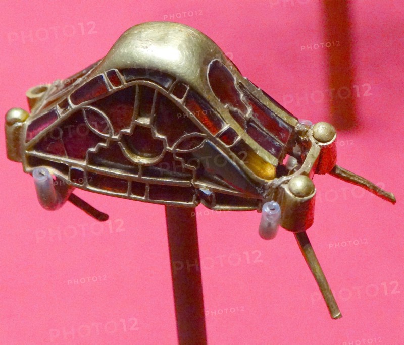 Pommel cap, decorated with cloisonné garnets. Staffordshire Hoard. Anglo-Saxon. 7th or 8th centuries