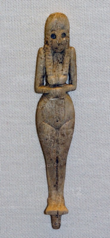 Ivory figure with hollow eyes and eyebrows from Ancient Egypt