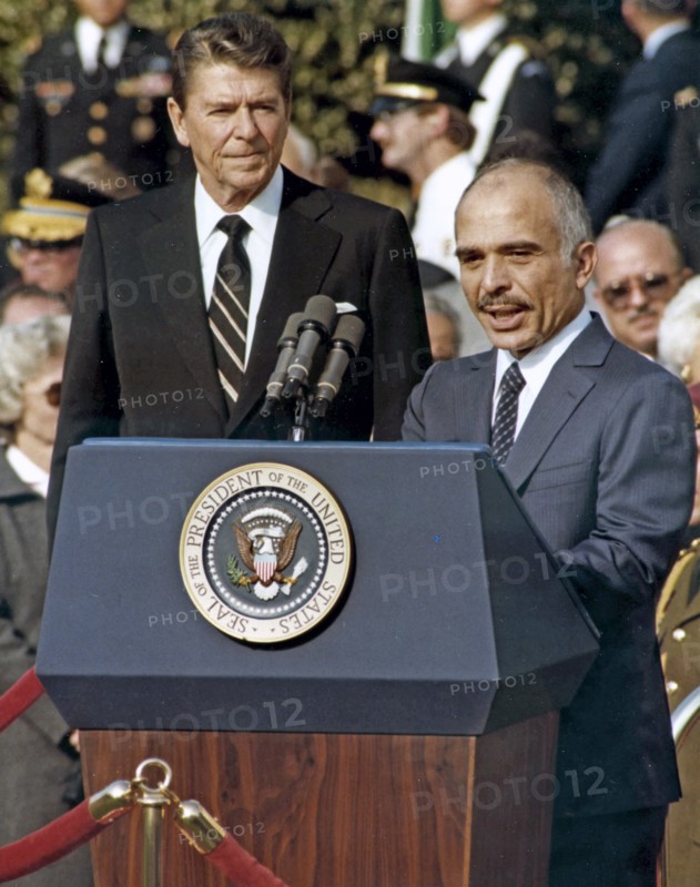 Photograph of King Hussein, addressing an audience at the White House with President Ronald Reagan