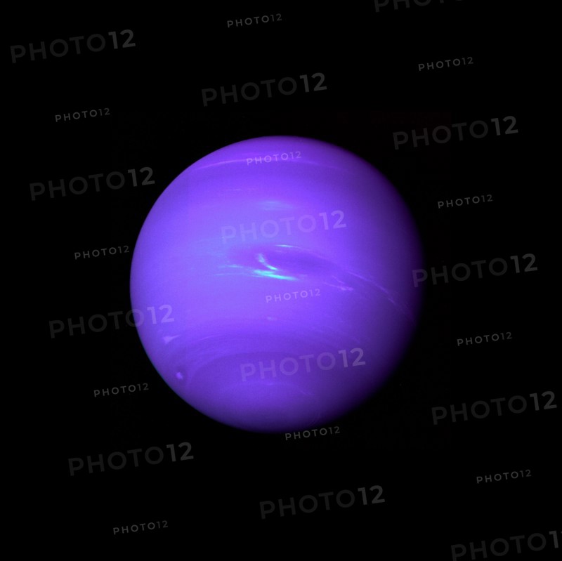 Photograph of the planet Neptune taken through the green and orange filters on the Voyager 2