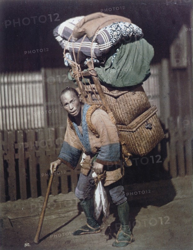 Hand-coloured photograph of Japanese man by Felice Beato