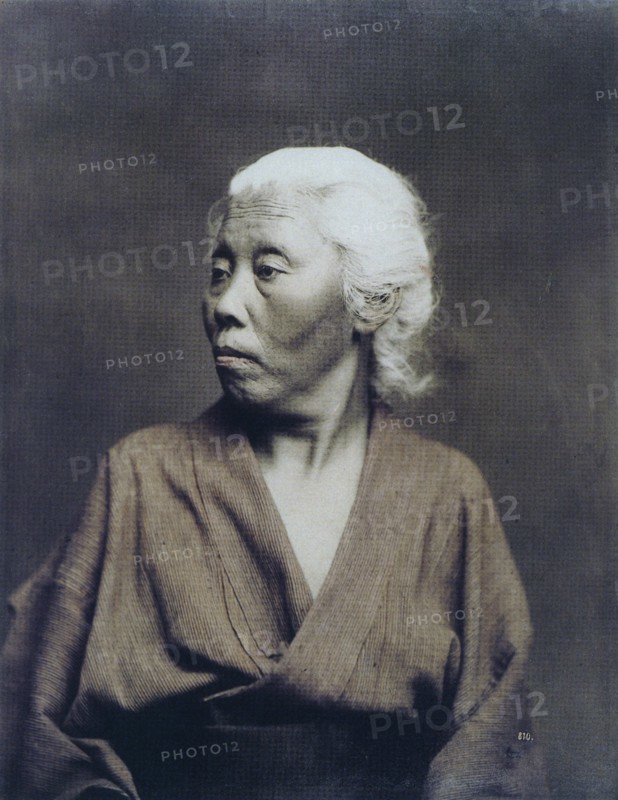 Hand-coloured photograph of Japanese woman by Felice Beato