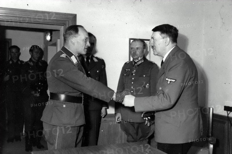 Adolf Hitler awards the Iron Cross to Lieutenant General Rainer Stahel