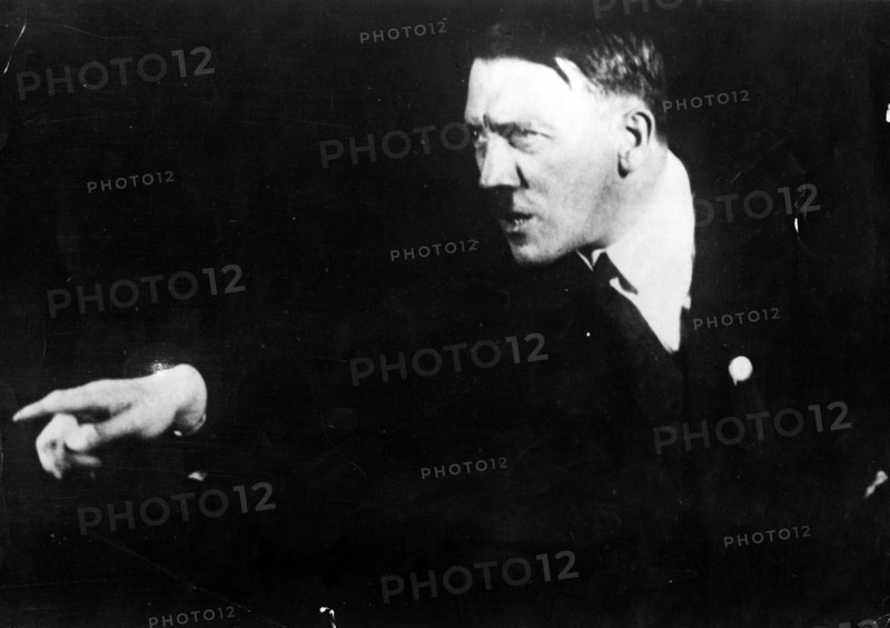 German Nazi leader Adolf Hitler, rehearsing a speech in front of the mirror 1933