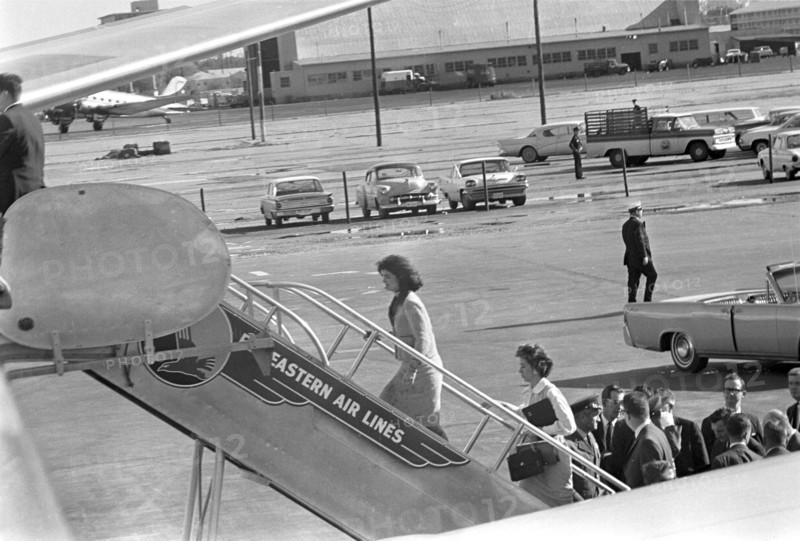 Photograph of the First Lady Jacqueline Kennedy boarding Air Force One