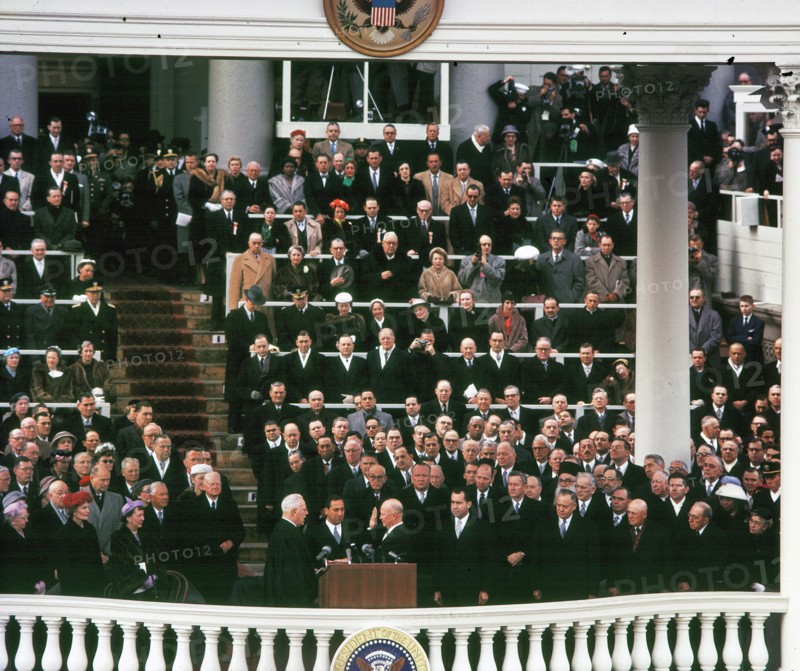 Earl Warren,swearing Dwight Eisenhower into office as President