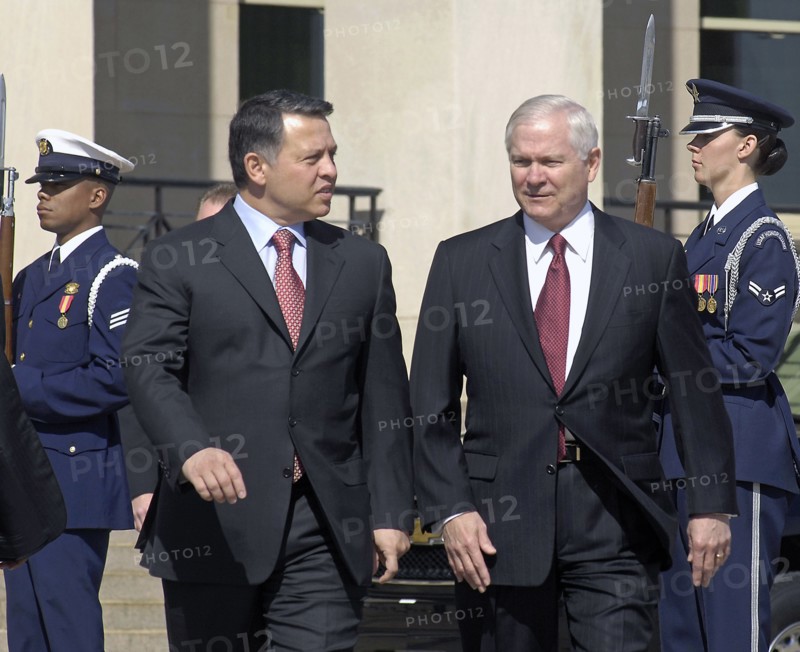 Robert M. Gates, right, escorts King Abdullah ll of Jordan