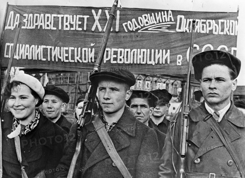 Photograph of Factory workers drilling with guns in their free time in the USSR