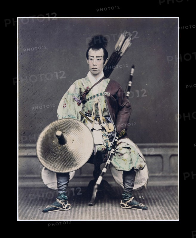 Hand-coloured photograph of a Japanese archer Photographed by Felice Beato