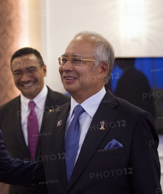 Photograph of United States Secretary of Defense Chuck Hagel and Malaysian Prime Minister Najib Razak Def Min Hishammuddin Tun Hussein