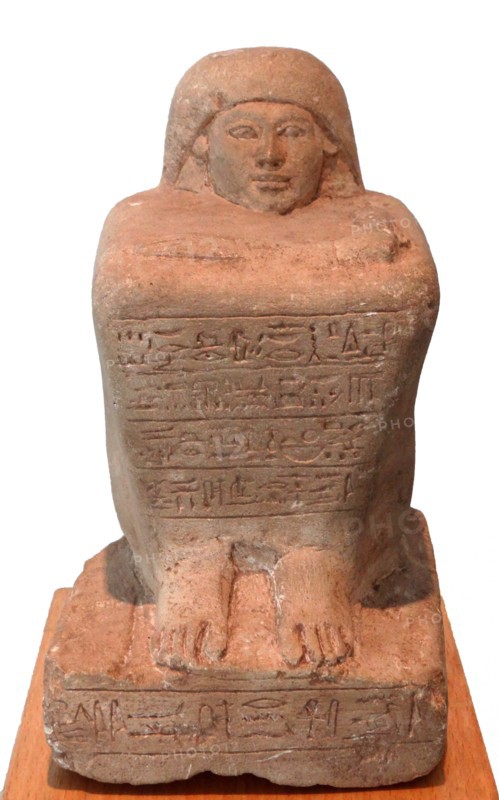Egyptian block statue of a scribe called Huy.