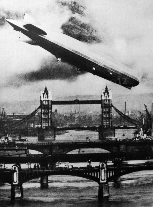 The German airship the Graff Zeppelin flies over Tower Bridge