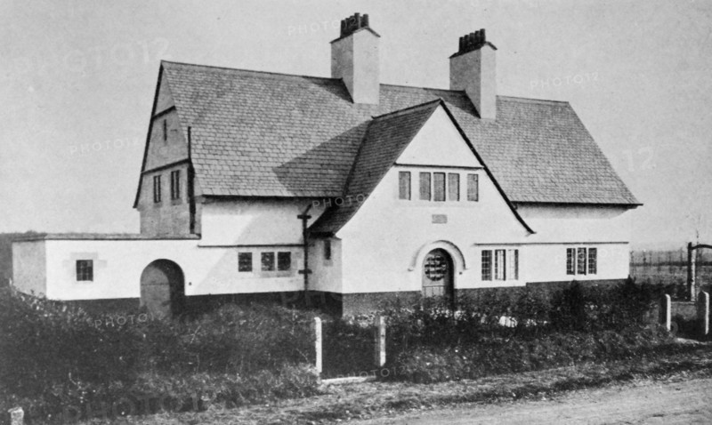 Photograph of the exterior of a Voysey House in Beaconsfield