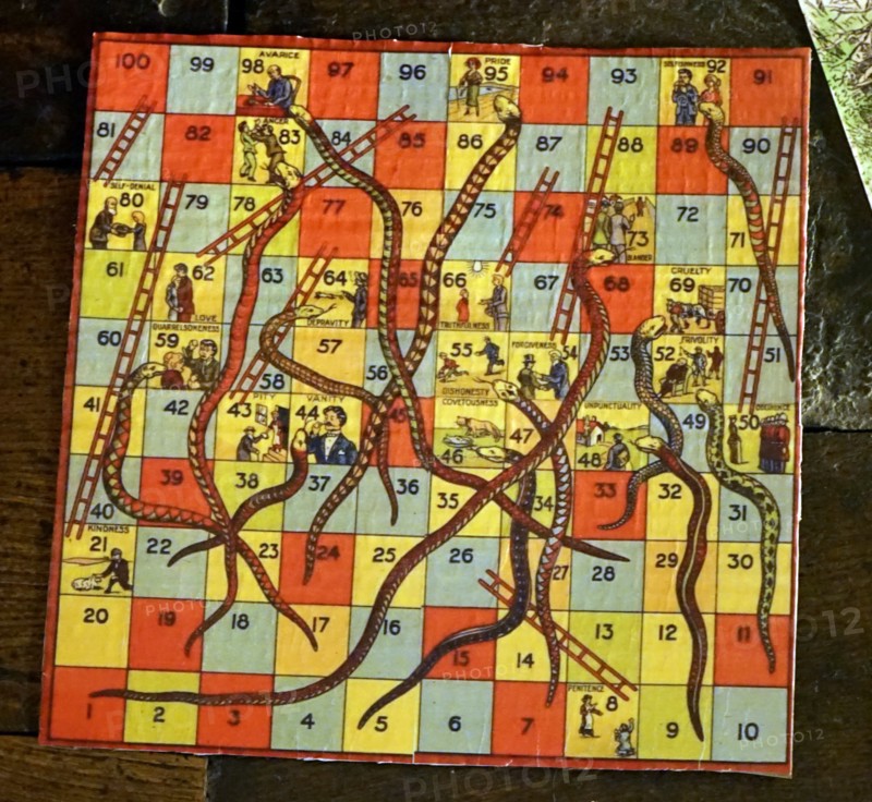 Snakes and ladders board game