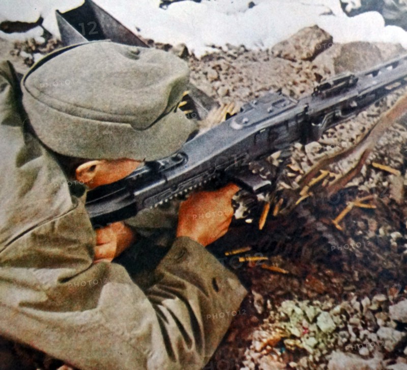 German soldier aiming a gun