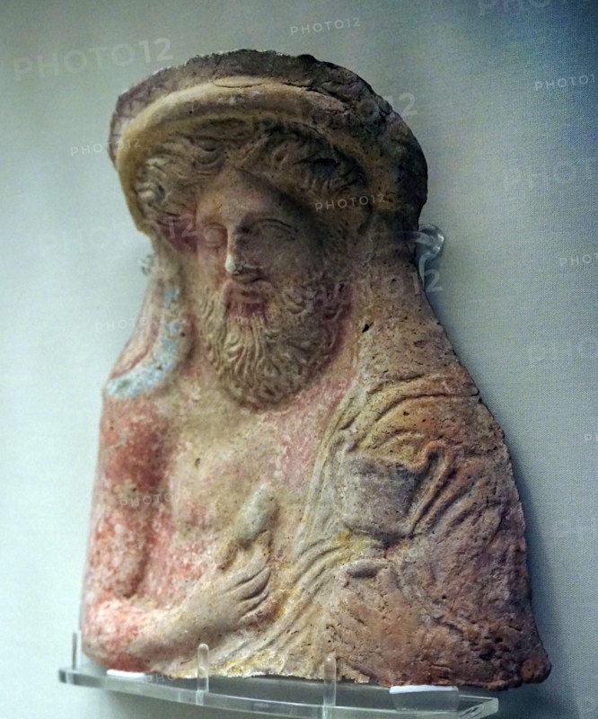 Dionysos holding a kantharos and an egg
