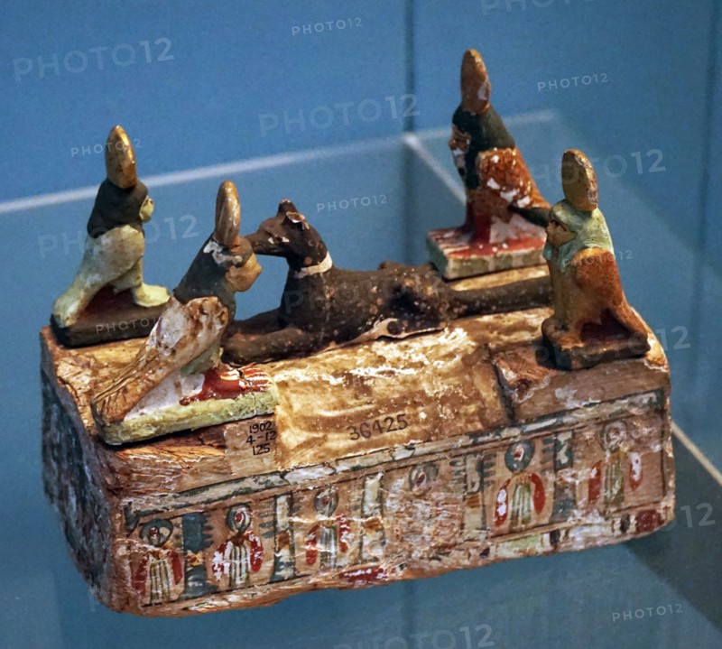 Miniature sarcophagus of painted wood