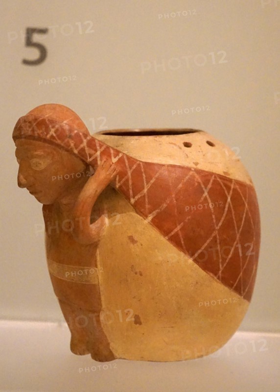 Person bearing large vessel
