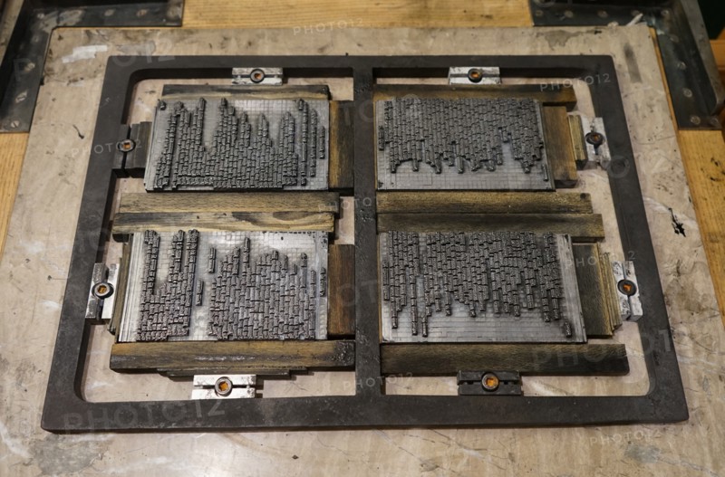 Metal plate with letters set to print