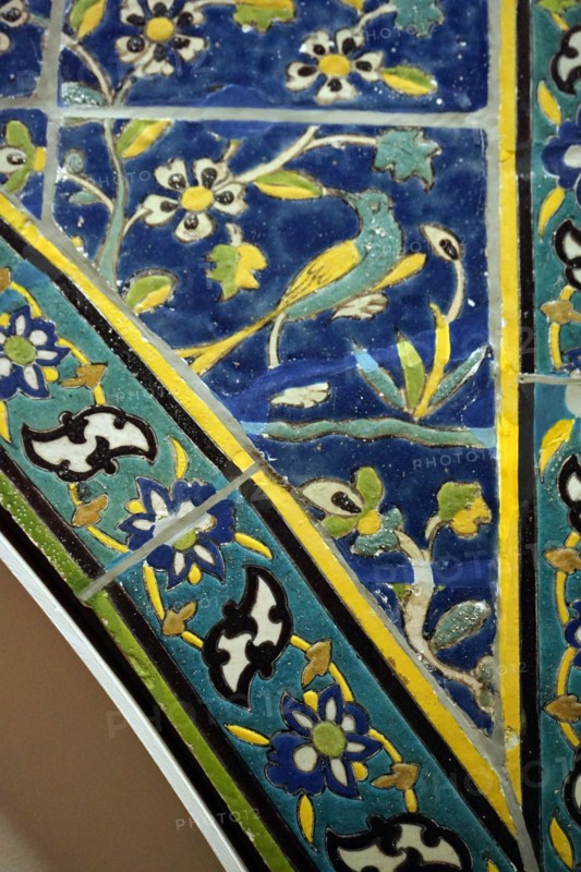 Tiled spanrel painted in cuerda seca technique