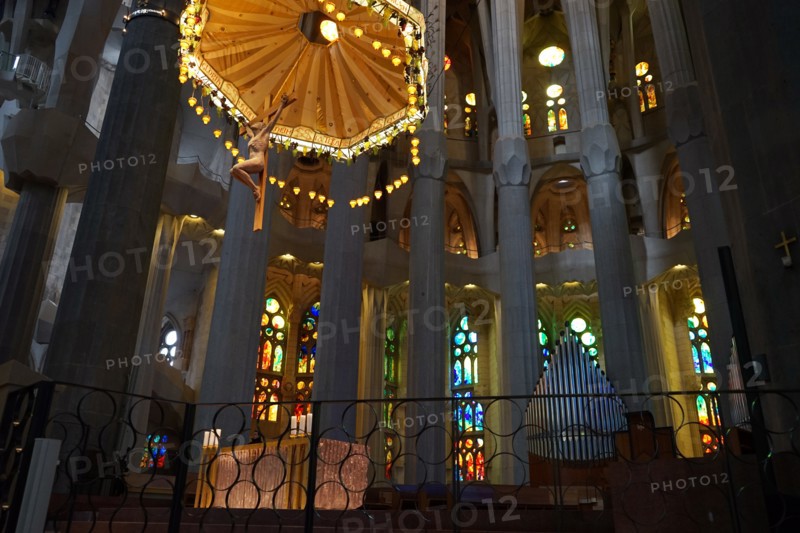 Suspended crucifix and glass altar in La Sagrada Família