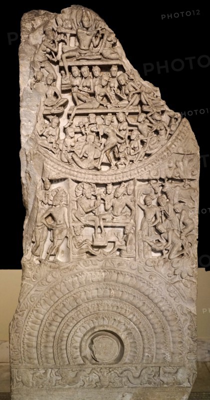 Railing depicting a court scene with a haloed princely figure