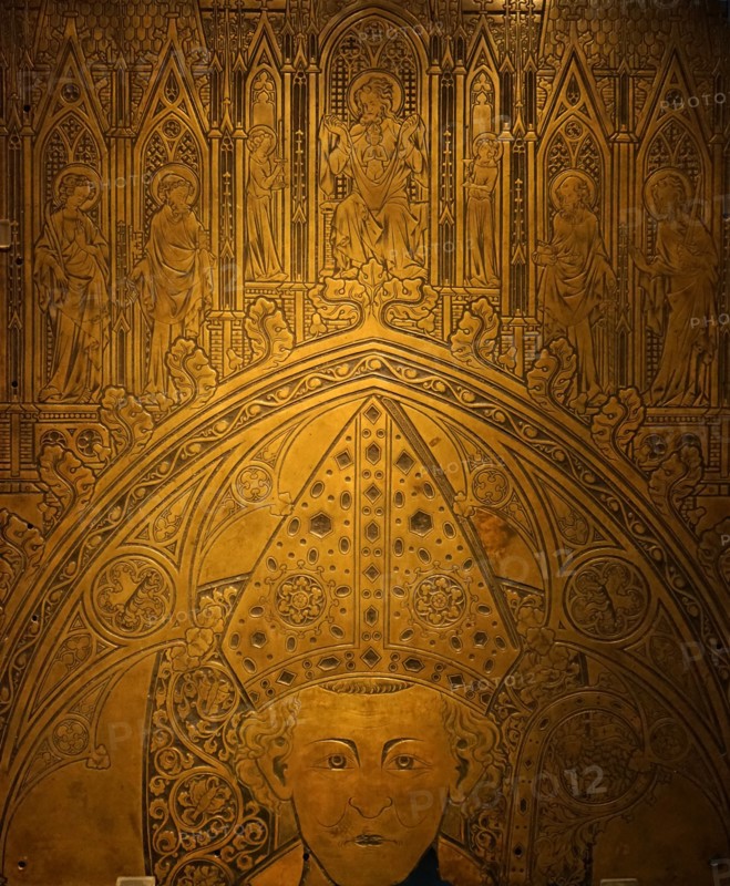 Fragment of a memorial brass for a deceased bishop