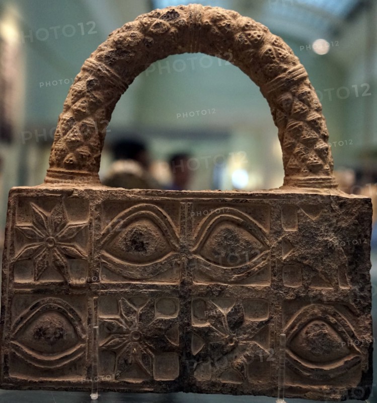 Carved stone with integral handle from the ancient city of Ur