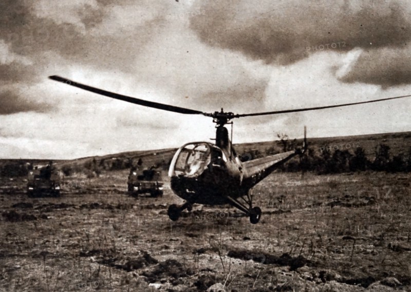 Photograph of a Helicopter landing in a very small area