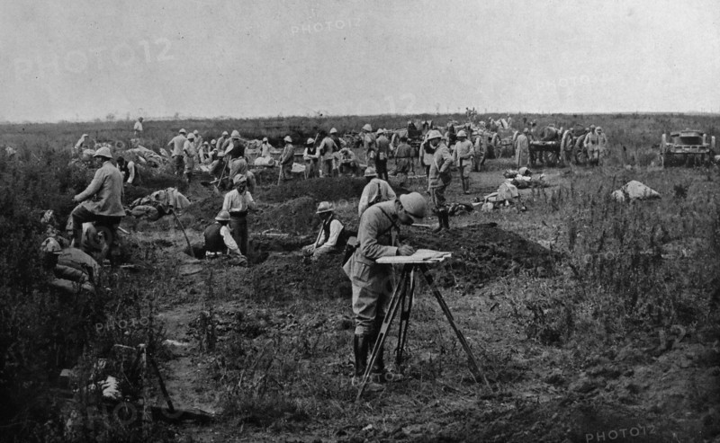 French soldiers rest during an advance towards German positions.