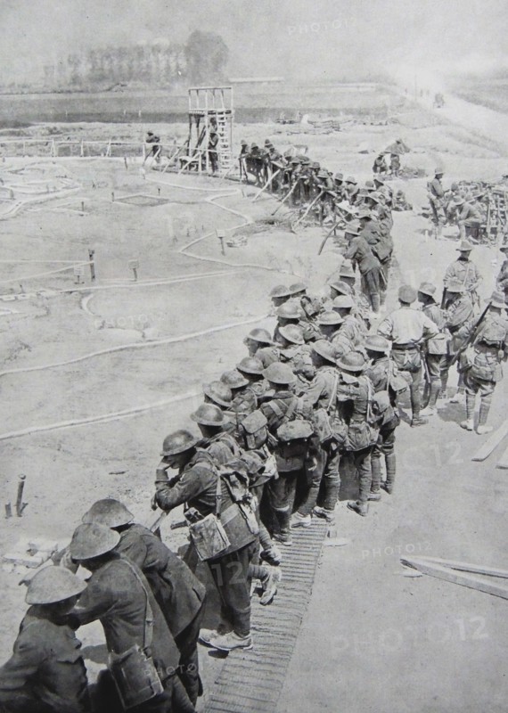 Australian soldiers receive a briefing.