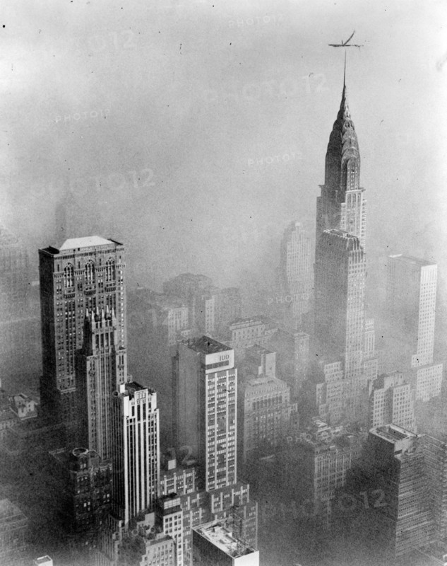 Smog obscures view of Chrysler Building from Empire State Building, New York City