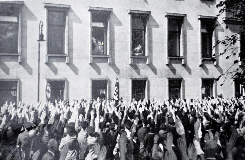 Nazi supporters gather to wave to Hitler