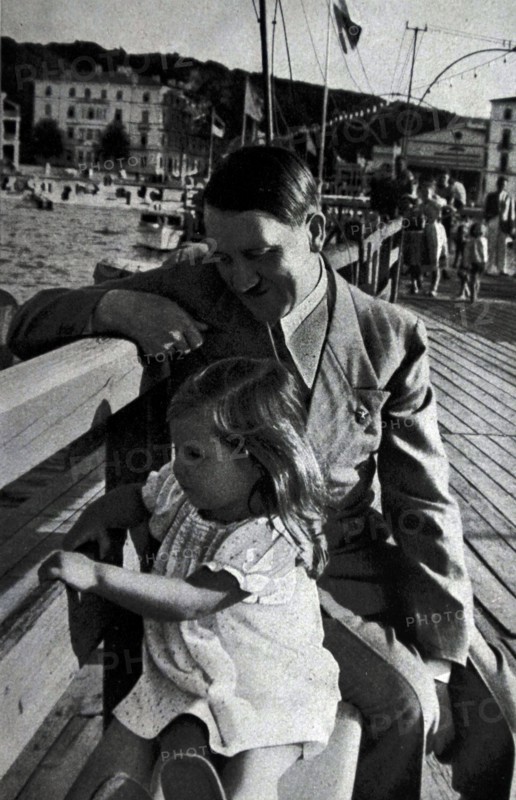 Adolf Hitler on a day at the coast, accompanied by Helga daughter of Dr Josef Goebbels