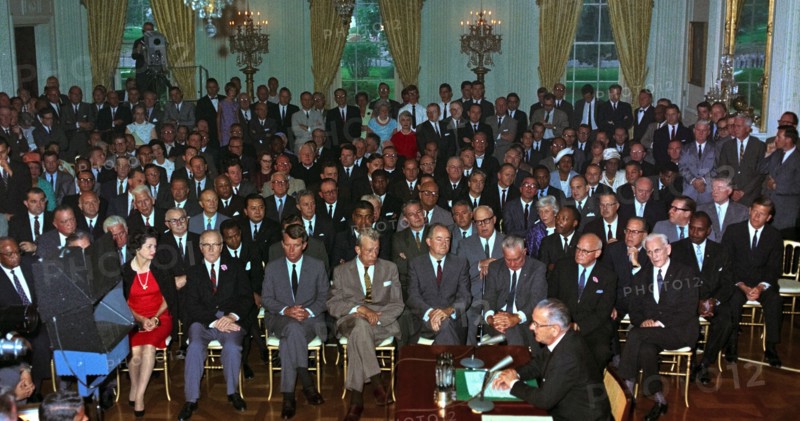 The Civil Rights Act of being enacted by President Lyndon Johnson, July 2, 1964.