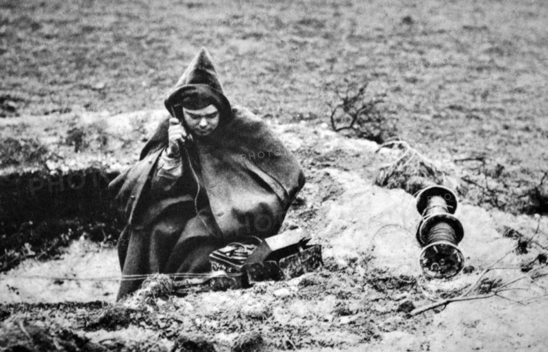 WWII: French army radio operator telephones instructions at a front line position 1940