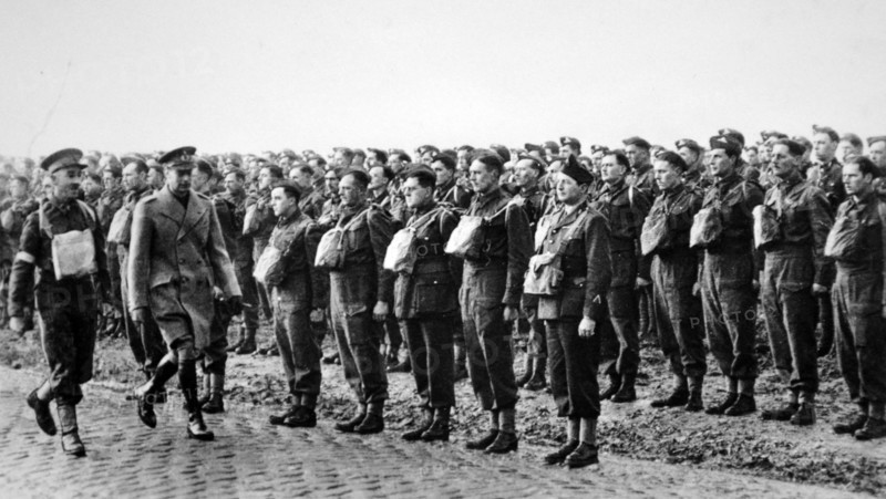 King George VI of Britain greeted by British soldiers in France