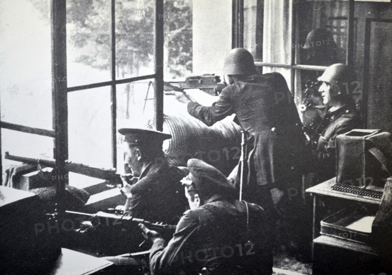 republican soldiers fire from a building during the Spanish civil war, Barcelona 1937
