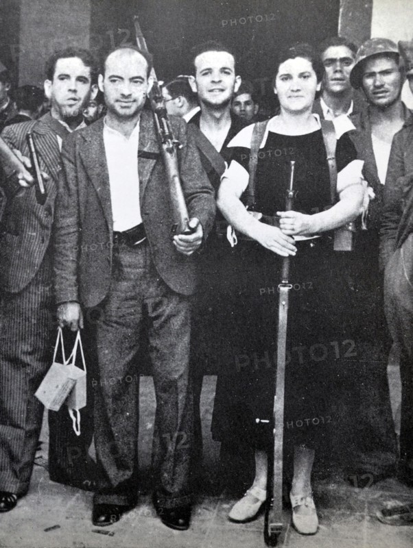 A female fighter with republican soldiers during the Spanish civil war, Barcelona 1937